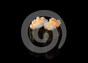 Spicy Gunkan maki sushi with scallops, black background