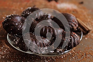 Spicy home-made chocolate from small metal forms