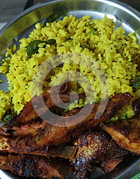 Spicy Indian tempered rice and fried fish pomfret masala 1