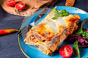 Spicy lasagne with tomato sauce and basil