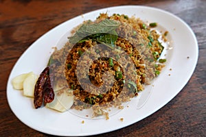 Spicy minced  fish salad in dish. Thai food .LaabPla Chon Tod