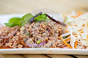 Spicy minced pork salad Isaan food