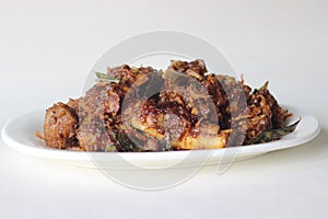 spicy mutton roast prepared in Kerala style