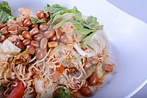 Spicy noodle salad - instant noodle  on white bowl for Thai food