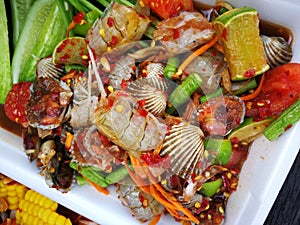 spicy papaya and corn salad with black crab Thailand  called farmer crab and fresh shrimp