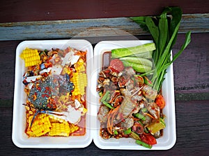 spicy papaya and corn salad with black crab Thailand  called farmer crab and fresh shrimp