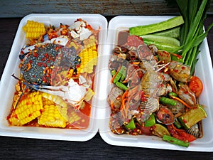 spicy papaya and corn salad with black crab Thailand  called farmer crab and fresh shrimp