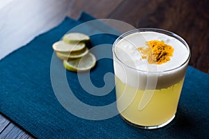 Spicy Pisco Sour Cocktail made with Lime juice, Egg White and Peruvian Grape Schnaps.