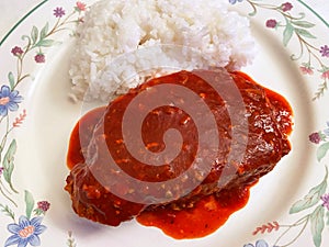 Spicy Pork Meat in Chili Guajillo Sauce With White Rice photo