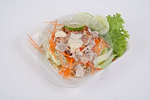 Spicy Pork Salad or Boiled Pork with Lime Garlic and Chili Sauce isolated on white background