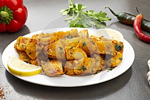 Spicy potato cut in cubes and fried, lebanese cuisine