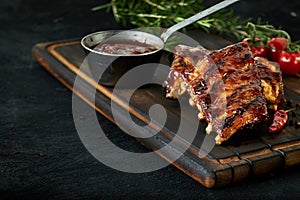 Spicy rack of spare ribs with marinade and chili