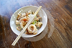 Spicy Rice Noodles Soup with pork rind, Thai style food.