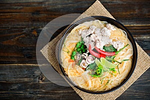 Spicy rice noodles soup with spices and herbs Thai Tom Yum