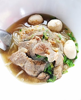 Spicy Rich Flavour Noodle With Sliced Pork and Pork Balls photo