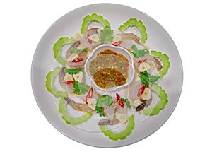 Spicy salad with raw shrimp in fish sauce and garlic isolate on white background with clipping path.Kung Chae Nampla