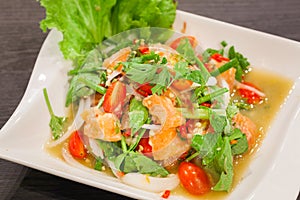 Spicy salmon salad with mixed vegetable.