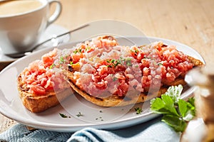 Spicy salsa topping and coriander on tostada photo