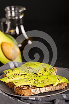 Spicy sandwiches with avocado sliced on rustic bread
