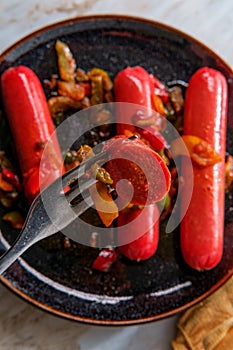 Spicy Sausage Peppers and Onions