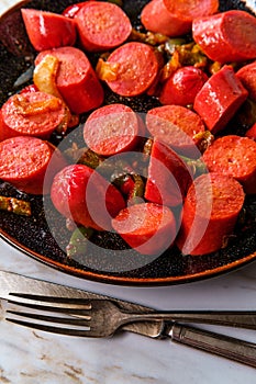 Spicy Sausage Peppers and Onions