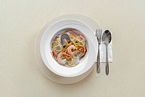 Spicy seafood spaghetti aglio olio. Flat lay food on table concept