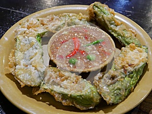 Spicy Shrimp Paste Dip Nam Prik Kapi with deep fried long eggplant slices