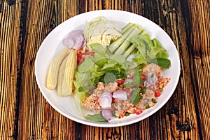Spicy sour carp eggs of silver barb fish salad photo