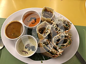 Spicy south indian dishes served with local chutney