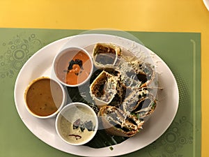 Spicy south indian dishes served with local chutney