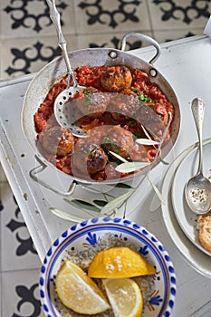 Spicy Spanish meatballs with local produce photo