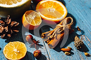 Spicy spices with different citrus fruits and nuts