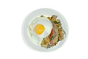 spicy stir-fried chicken meat and gizzard with basil on rice topping egg