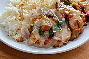 Spicy stir fried crispy pork with basil leaf