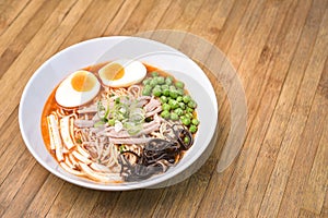 Spicy Tom Yum, Creamy Pork Ramen with Egg, Sugar Pea, Tofu and M