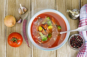 Spicy tomato vegetable soup, top view