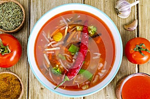 Spicy tomato vegetable soup, top view