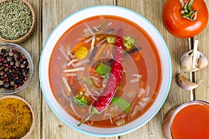 Spicy tomato vegetable soup, top view