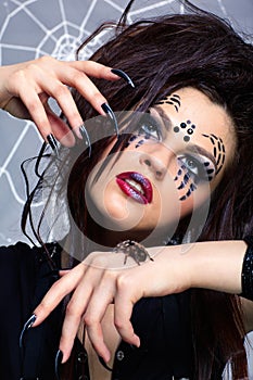 Spider girl and spider Brachypelma smithi