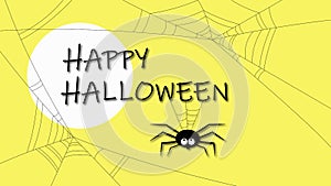 Spider hanging on happy halloween letters
