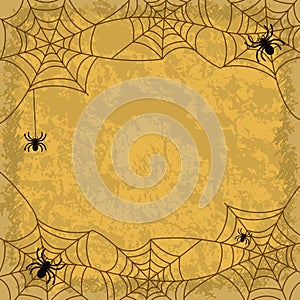 Spiders and cobwebs on wall background