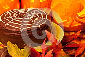 Spiders web chocolate cake and pumpkins