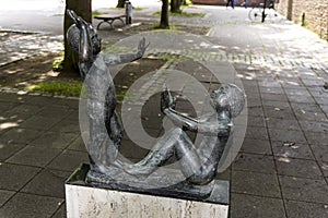 Spielende Kinder Playing Children Statue near St Mary`s Church Rostock Germany