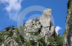 spike rock like a big nose in the alps