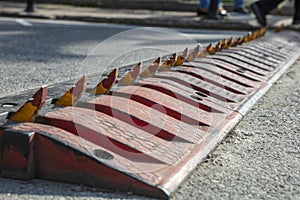 Spikes barrier are frequently used to enforce a directional flow in a single traffic lane barrier photo