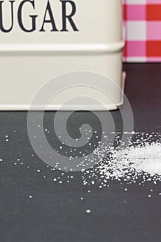 spill of sugar from a container