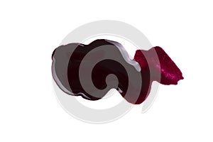 Spilled bordo nail polish isolated on white background. Blot of nailpolish. Nail varnish sample.