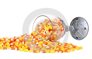 Spilled glass of candy corn