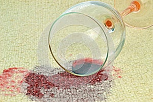 A spilled glass of red wine