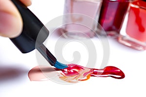 Spilled nail polish. Dripping nail polish. capsized nail polish. mixing nail polish. photo